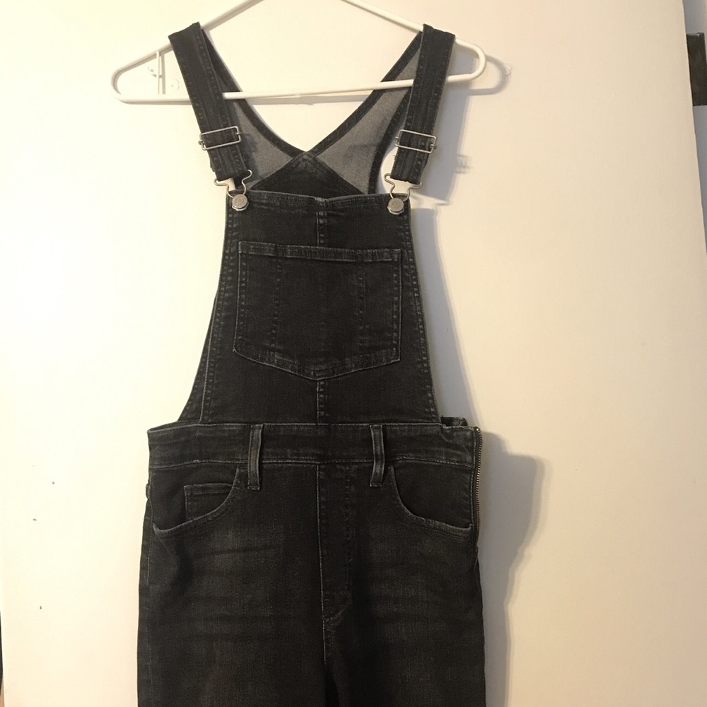 Snug fitting black overalls
